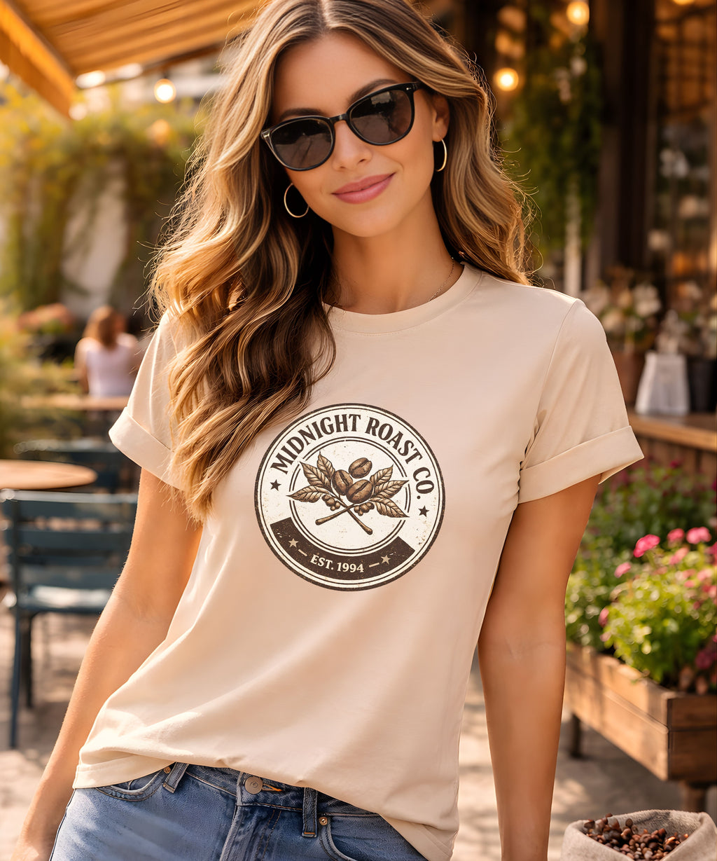 Woman wearing vintage Midnight Roast coffee lover T-shirt and sunglasses at outdoor cafe